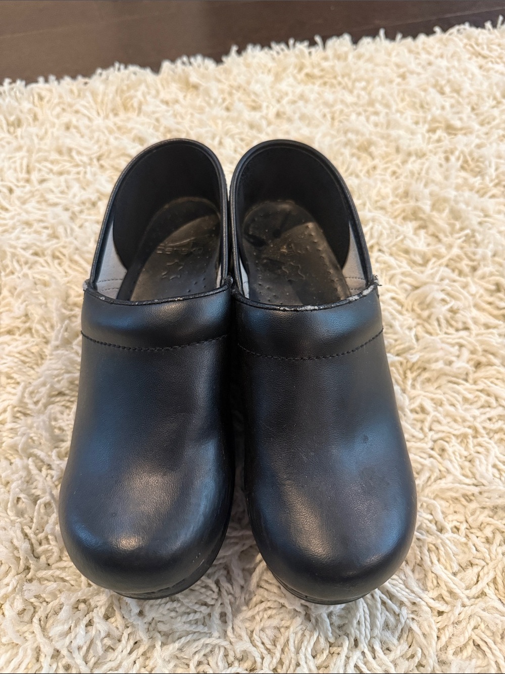 Dansko Black Leather Slip-On Clogs